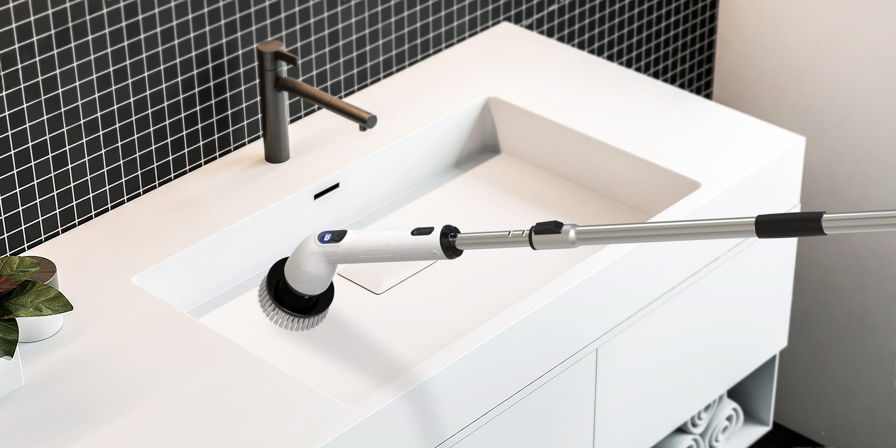TUYU electric brush scrubbing a white bathroom sink